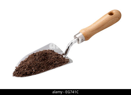 Garden Trowel with Potting Soil isolated on white. Stock Photo