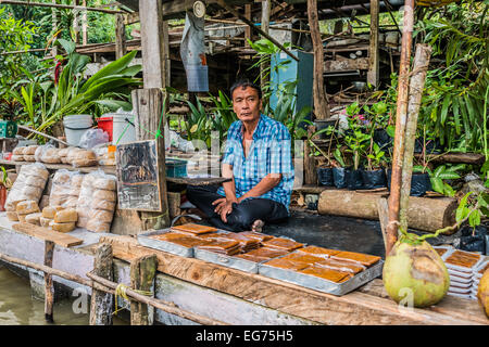 Bangkok, Thailand - December 30, 2013: seller at Amphawa Bangkok floating market at Bangkok, Thailand on december 30th, 2013 Stock Photo