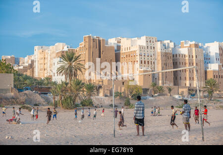 SHIBAM, YEMEN - February, 21: Yemeni boys playing soccer at Shibam, Hadramaut provence, Yemen on February, 21, 2011 Stock Photo