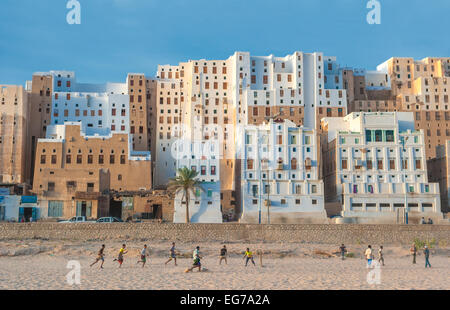 SHIBAM, YEMEN - February, 21: Yemeni boys playing soccer at Shibam, Hadramaut provence, Yemen on February, 21, 2011 Stock Photo