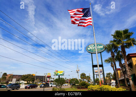 Stars and Stripes, the flag of United States of America, flying on International Drive, Orlando, Florida, USA Stock Photo