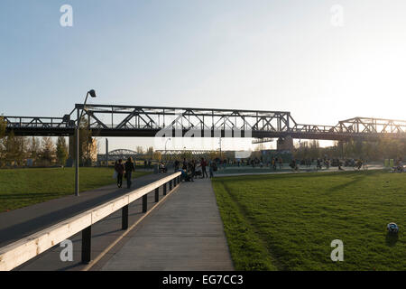 People enjoying Gleisdreieck park in Berlin on a Sunday afternoon Stock Photo