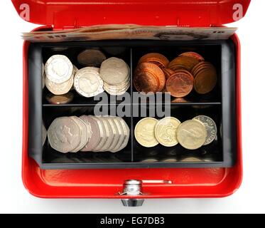 A red petty cash tin with a float of money inside Stock Photo