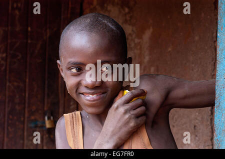 A cheeky smile from a young Kenyan boy Stock Photo