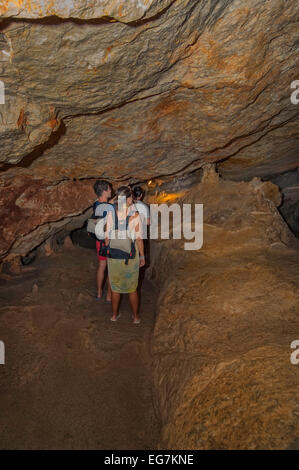 Group of tourist exploring  the cave  San Marca  in Ibiza Stock Photo