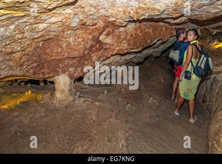 Couple excursions " San Marca" cave in ibiza, Spain Stock Photo
