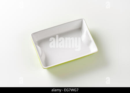 Rectangle ceramic baking dish - white on the inside, green on the outside Stock Photo