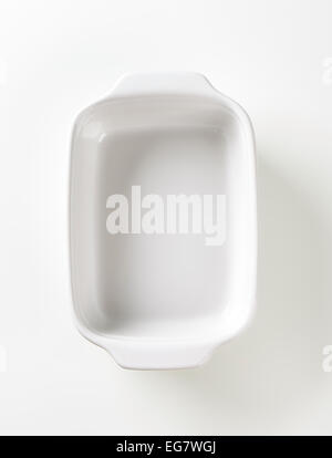 Classic white ceramic casserole dish with handles Stock Photo
