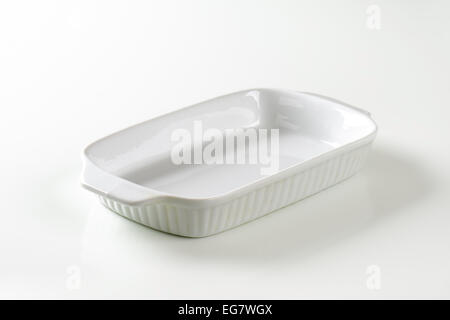 Classic white ceramic baking dish with handles Stock Photo