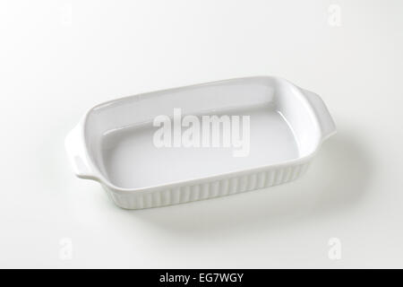 Classic white ceramic baking dish with handles Stock Photo