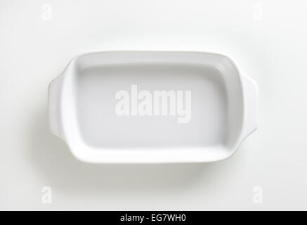 Classic white ceramic baking dish with handles Stock Photo