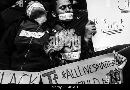 University Park, Pennsylvania, USA. 2nd Dec, 2014. A group of Penn State students lie on the floor protesting the Ferguson grand jury's ruling during a silent die-in protest in the HUB-Robeson Center. © Akash Ghai/ZUMAPRESS.com/Alamy Live News Stock Photo