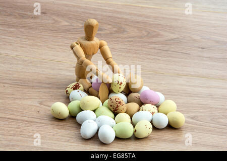 Easter eggs scattered on a wooden floor Stock Photo
