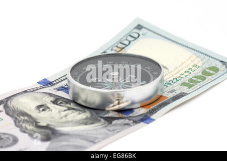 compass on 100 dollars banknote over white Stock Photo