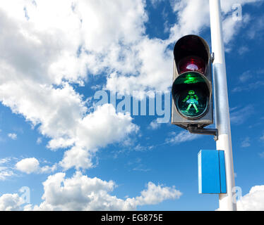 Green color on the traffic light for pedestrian, concept photo. Stock Photo