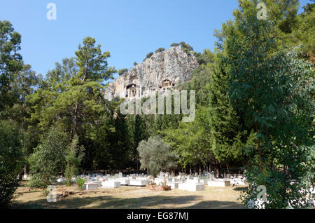 Dalyan cemetery with the Lycian rock tombs on the cliffs above, Turkey Stock Photo