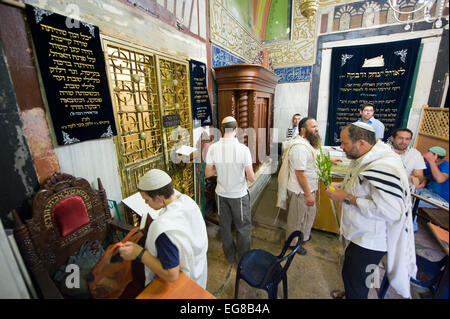 Jews are celebrating sukkot in front of the The tomb of Sarah, wife of patriarch Abraham. Stock Photo