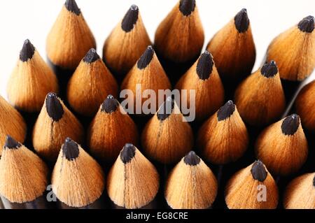 Black pencils showing the newly sharpened tips. Stock Photo