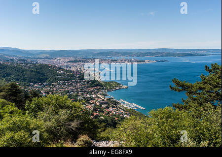 Trieste, Italy - An aerial view of the city and the Gulf of Trieste in summer with the port Stock Photo