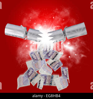 concept image of money falling from a Christmas cracker Stock Photo