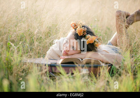 young girl reading and meditating Stock Photo