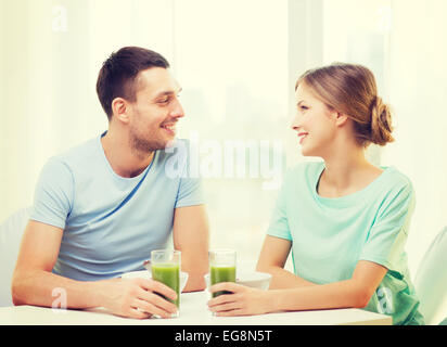 smiling couple having breakfast at home Stock Photo