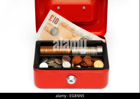 A red petty cash tin with a float of money inside Stock Photo