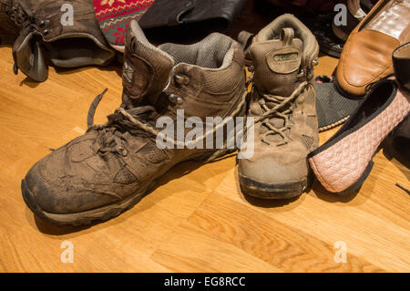 Pile of shoes in a student flat Stock Photo