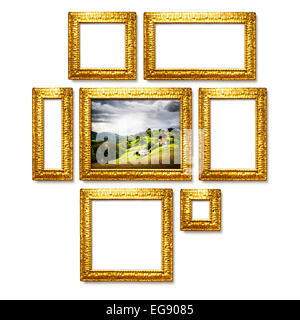 Antique golden frames collection on white background. Gallery wall ideas. Middle object with clipping path Stock Photo
