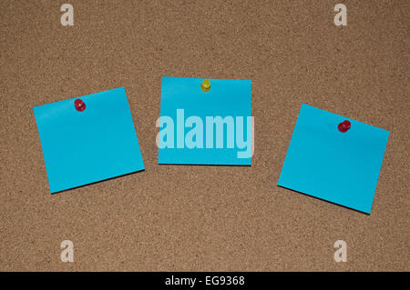 Blue sticky notes on a Cork Board Stock Photo