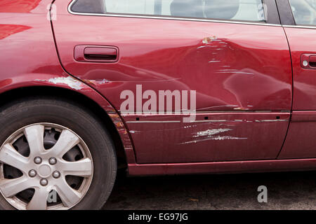 Scratched rear door of sedan - USA Stock Photo