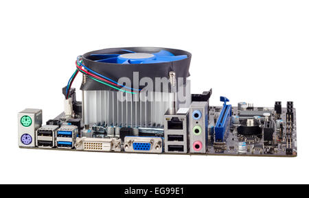 Computer motherboard isolated on white background with CPU cooler Stock Photo