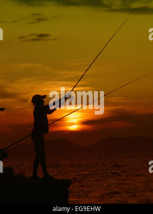 Fishing Rod Silhouette During Sunset Fishing Pole Against Ocean At Sunset Fishing  Rod In A Saltwater Boat During Fishery Day In The Ocean Stock Photo -  Download Image Now - iStock