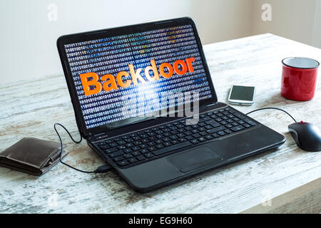 A software backdoor on a laptop computer. Stock Photo