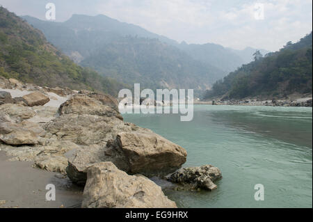 The Ganges or Ganga river in the foothills of the Himalaya, just above Rishikesh in Uttarakhand, North East India. Stock Photo