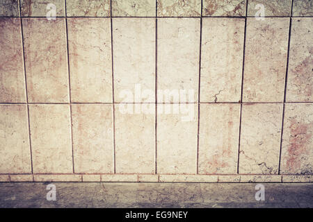 Abstract urban background interior with stone tiling on the wall and road pavement, retro photo filter effect Stock Photo