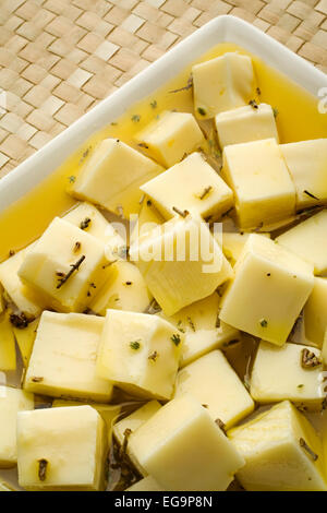 cheese in extra virgin olive oil queso al tomillo en aceite de olive virgen extra Stock Photo