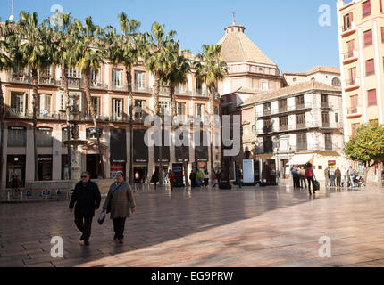 People walking across Plaza Constitucion, Malaga, Spain Stock Photo