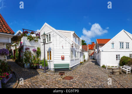 Street with white houses in the old part of Stavanger, Norway. Stock Photo