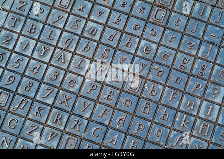Cast iron letters and numbers flooring in norfolk england UK europe Stock Photo