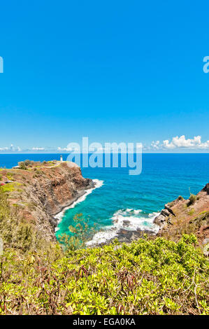 Kilauea lighthouse northern guide in Kauai island with calm ocean in background Stock Photo