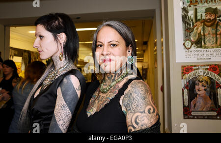 Brighton, UK. February, 2015. Delphine Noiztoy and Alica Cardenasat the 8th Brighton Tattoo Convention with ear tunnels Stock Photo