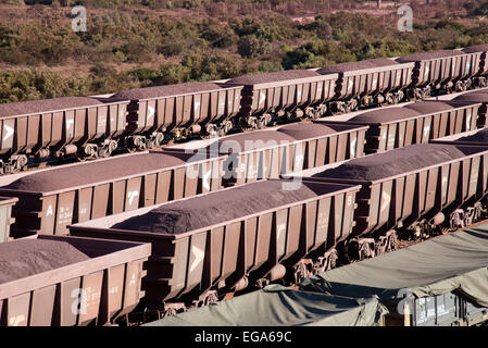 Iron Ore on railway wagons at Saldanha Bay Terminal Western Cape South Africa Stock Photo