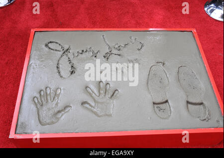 LOS ANGELES, CA - APRIL 12, 2014: Actor Jerry Lewis has his hand & footprints set in cement in the forecourt of the TCL Chinese Theatre, Hollywood. He was honored as part of the 2014 TCM Classic Film Festival. Stock Photo