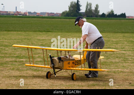 Biplane in preparation for flight at RC model air display Stock Photo