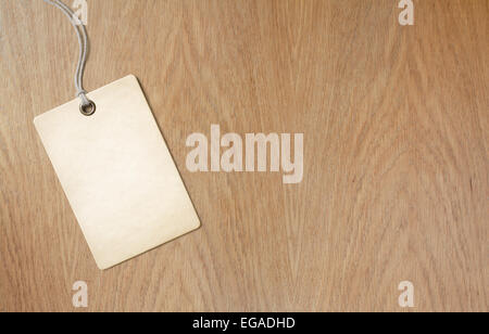 the blank price tag label on wooden background Stock Photo - Alamy