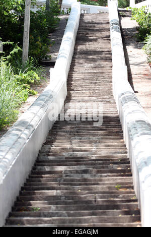 Stairs concrete up for the mountain to Thailand temple. Stock Photo