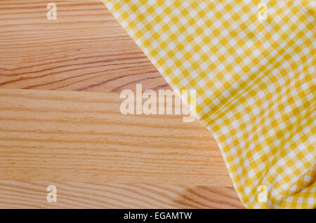 background of checkered fabric tablecloth on wood Stock Photo