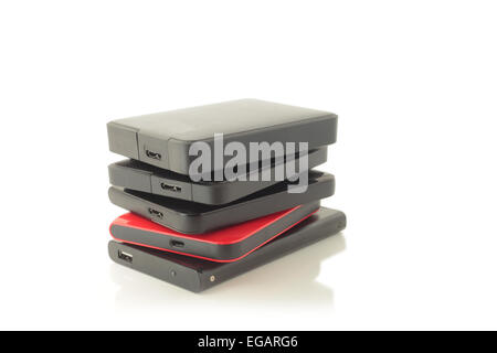 Stack of portable external hard drives. Stock Photo