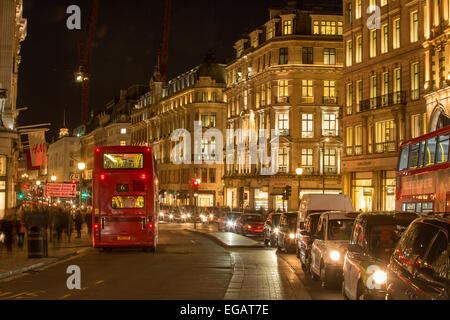 Rush hour on Regent Street, London, England on a damp winter evening Stock Photo